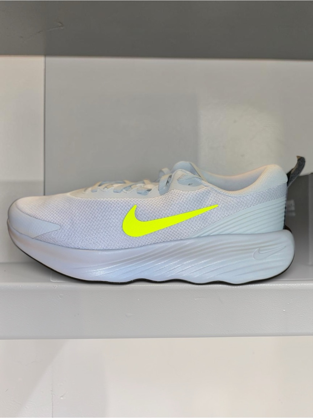 Nike Women's White Running Shoe with Neon Yellow Swoosh